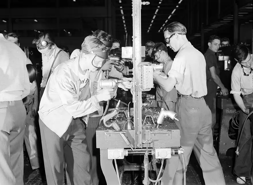 Workers assembling parts at the Willow Run bomber plant, 1942